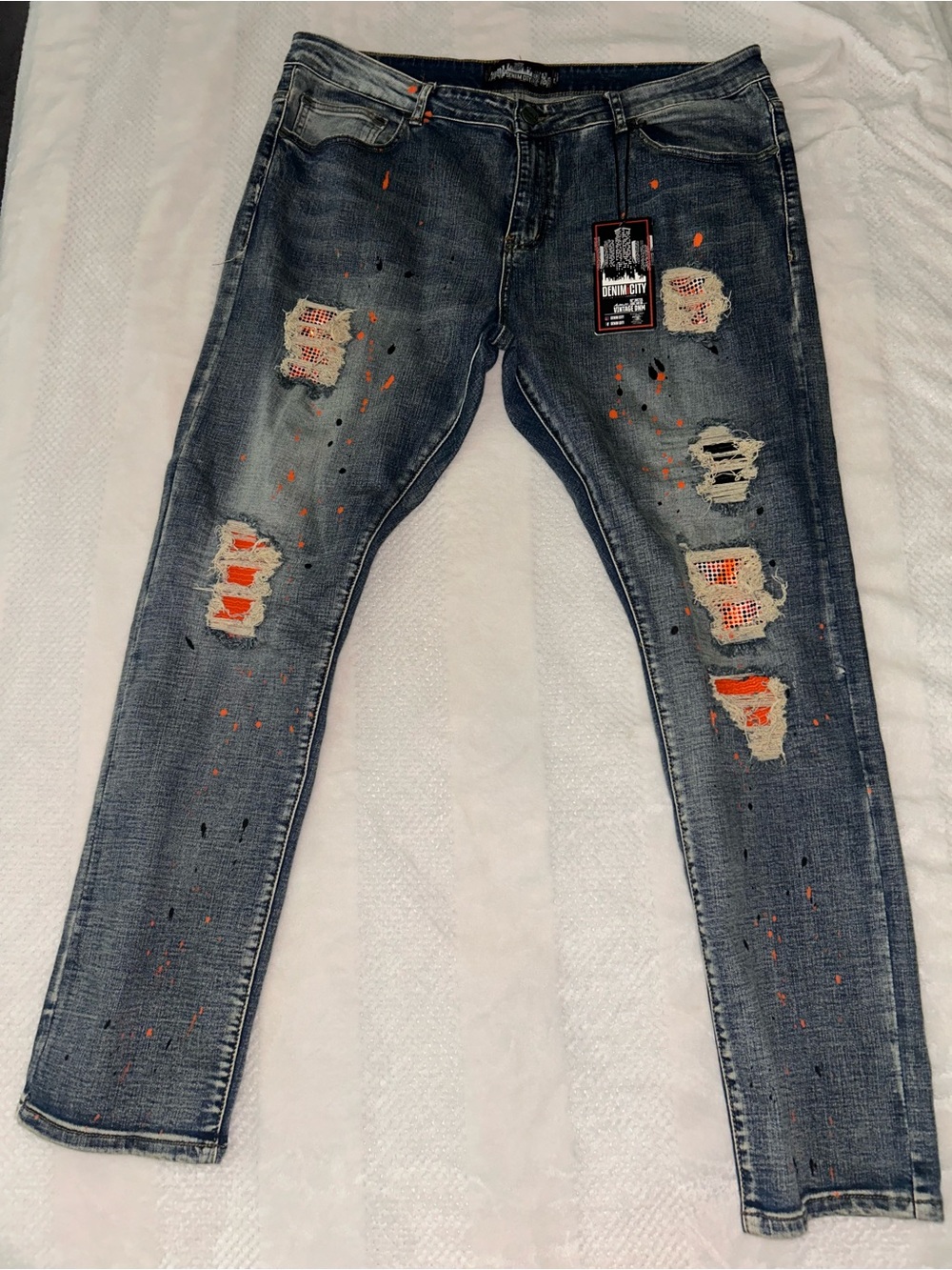 Skinny Distressed Blue Jeans with Orange Patch Details